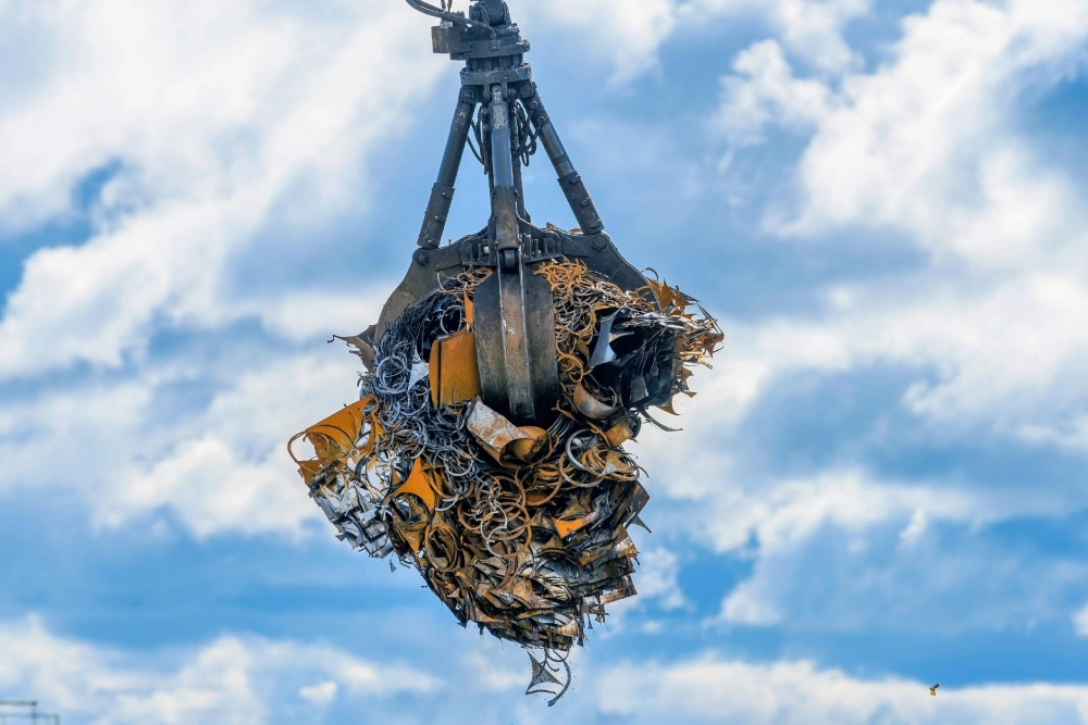 Image of a crane lifting scarp metal